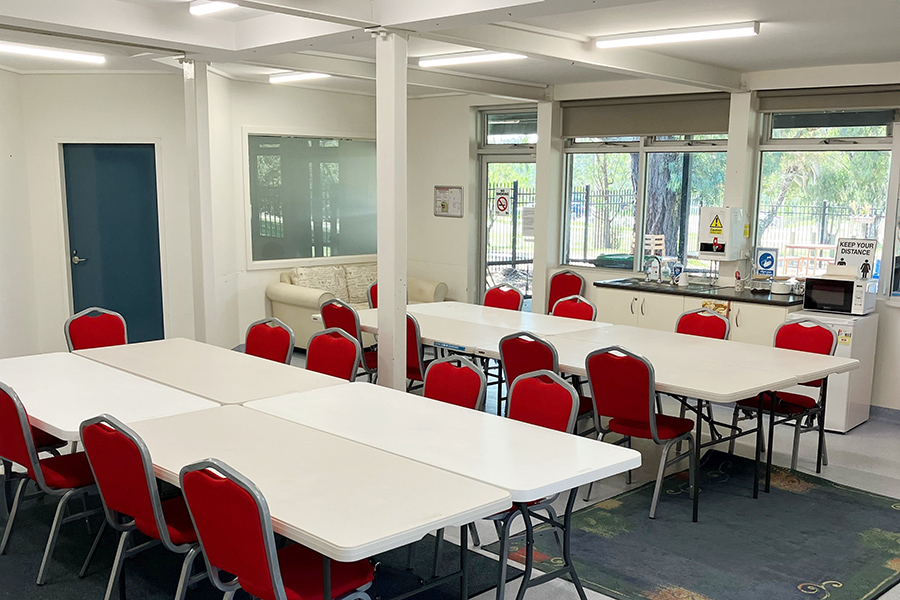 Room 1 classroom set up with tables and chairs